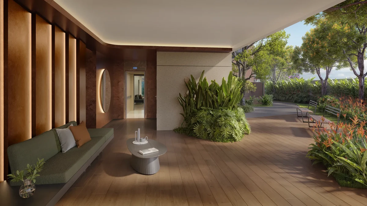 Recepção e portaria social decorada com sofás modernos, painéis ripados e vista para o jardim de entrada do Inc. Green Cambeba.